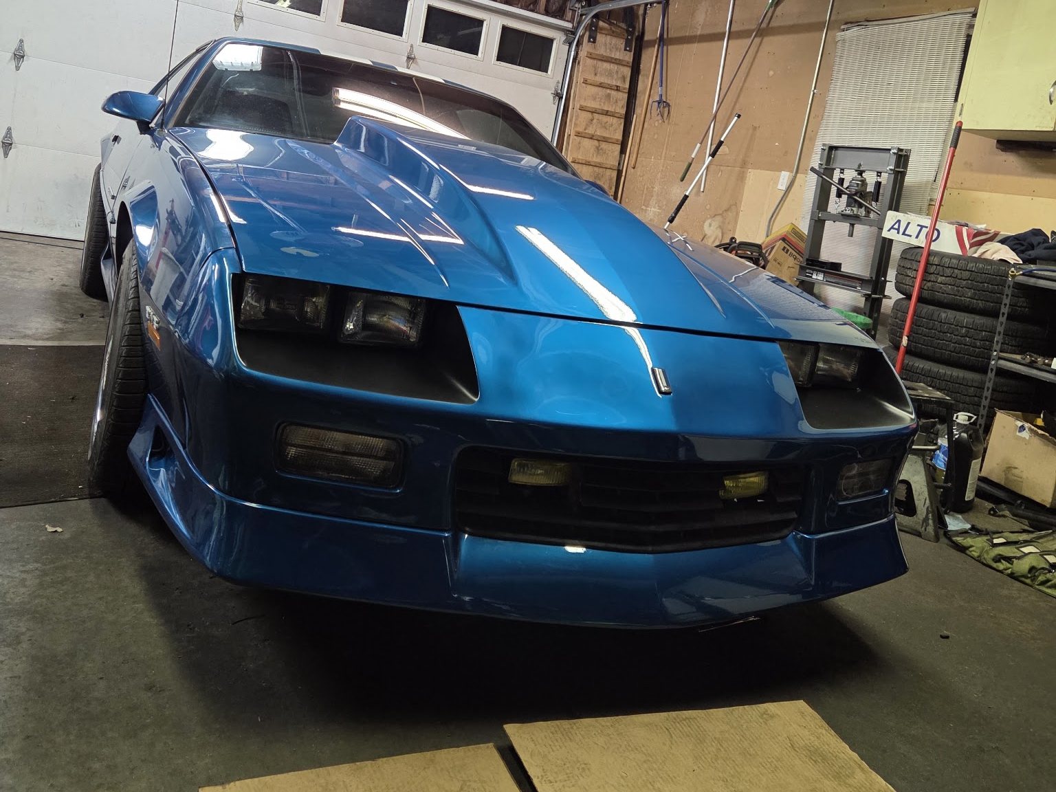 Blue Camaro in the paint shop