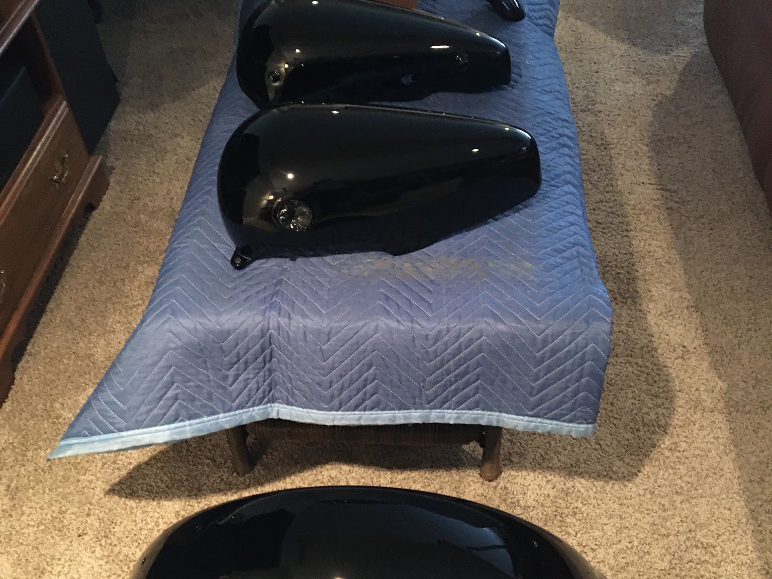 Freshly painted motorcycle tanks and fenders